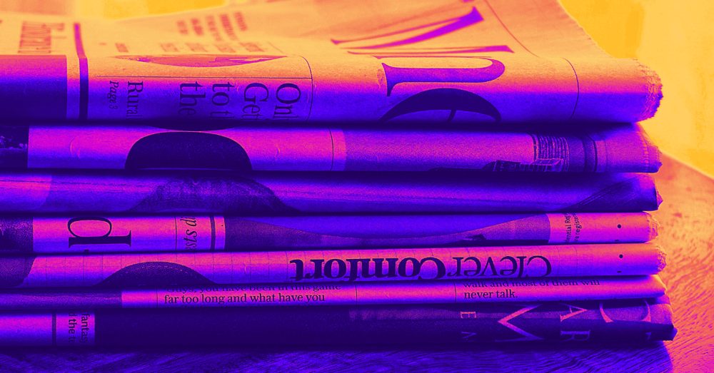 A stack of newspapers with a purple filter applied.